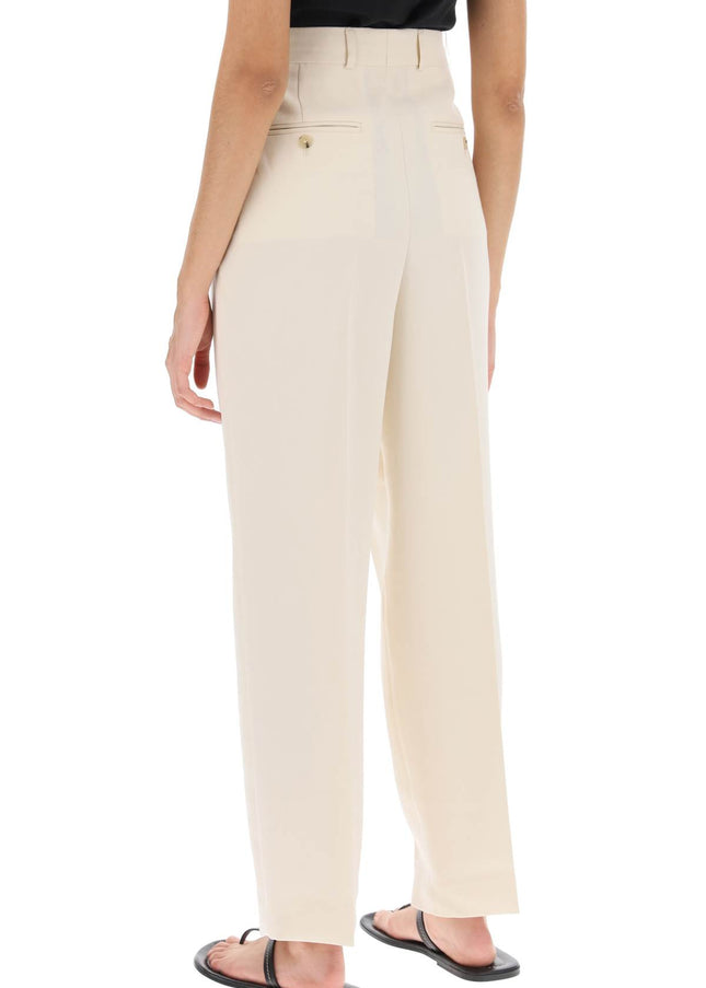 Toteme double-pleated viscose trousers