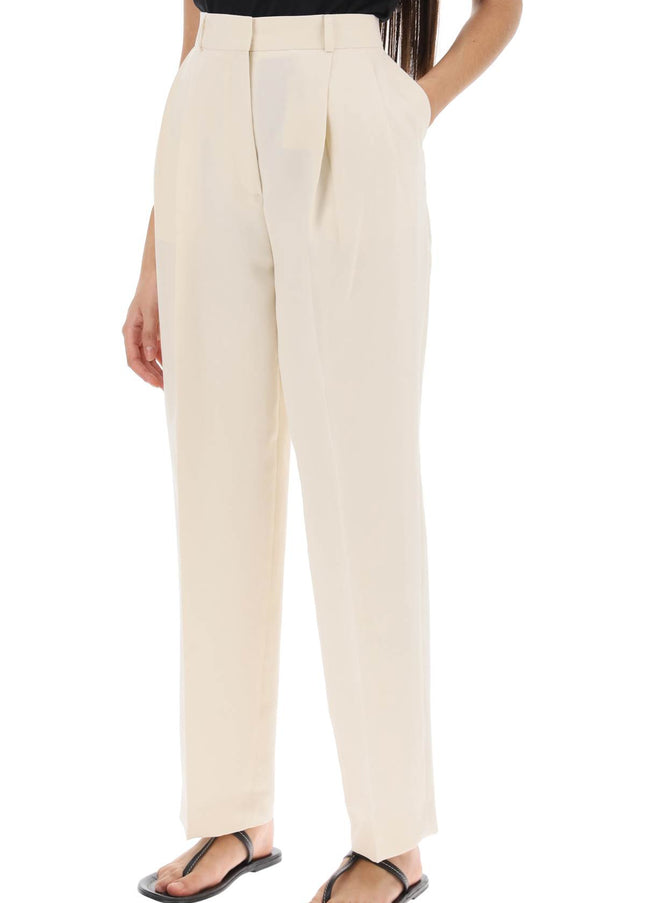 Toteme double-pleated viscose trousers