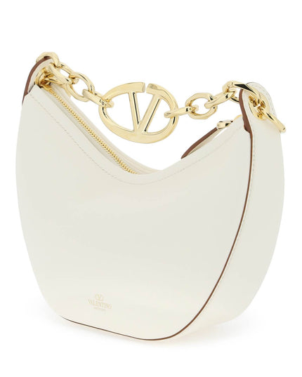 Valentino Garavani mini vlogo moon bag in nappa leather with chain