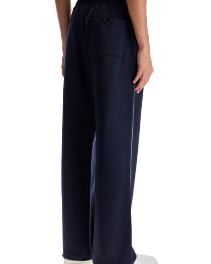 Valentino Garavani jogger pants with metallic v detail