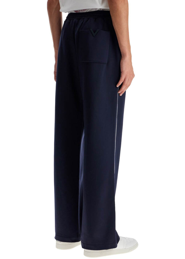 Valentino Garavani jogger pants with metallic v detail