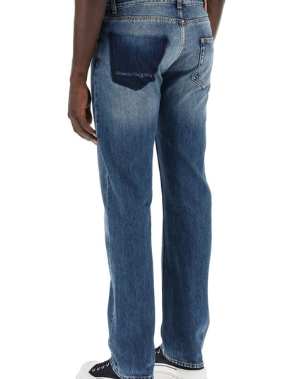 Alexander Mcqueen straight leg jeans with faux pocket on the back.