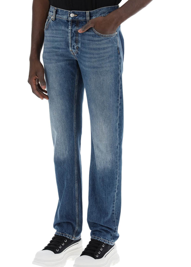 Alexander Mcqueen straight leg jeans with faux pocket on the back.