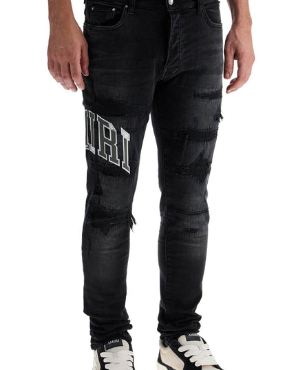 Amiri skinny jeans with varsity logo