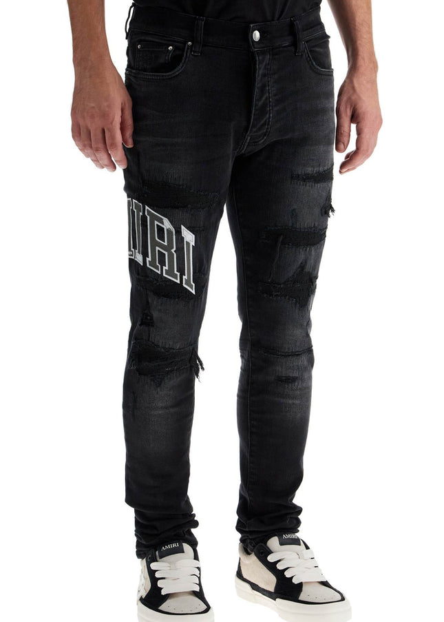 Amiri skinny jeans with varsity logo