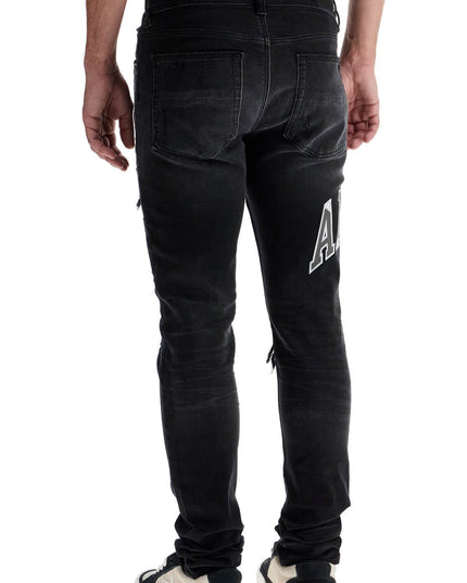 Amiri skinny jeans with varsity logo