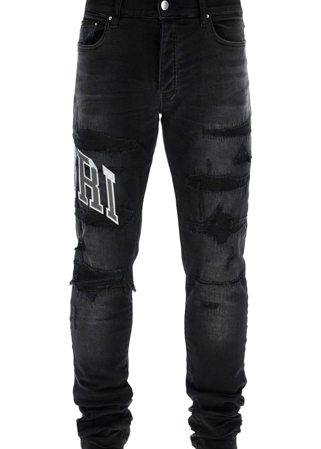 Amiri skinny jeans with varsity logo