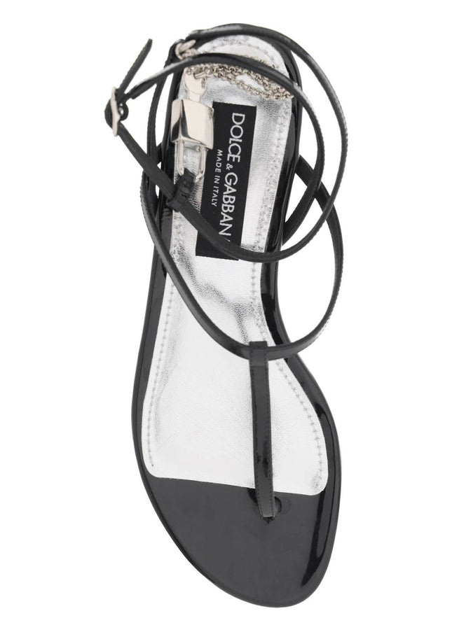 Dolce & Gabbana patent leather thong sandals with padlock