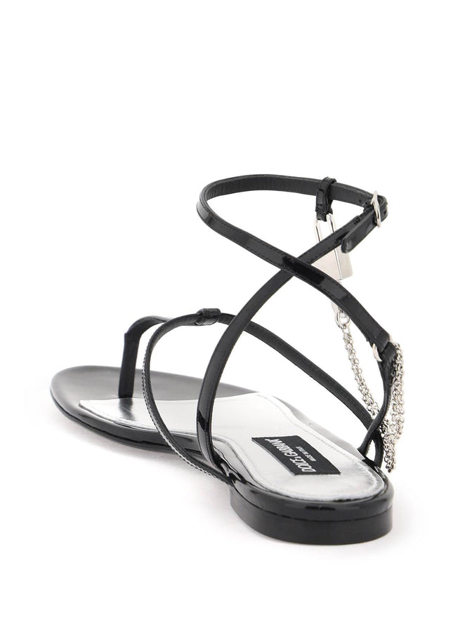 Dolce & Gabbana patent leather thong sandals with padlock