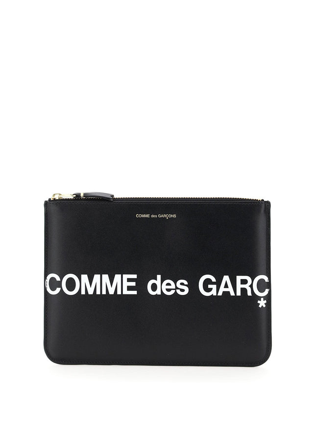 Comme Des Garcons Wallet leather pouch with logo