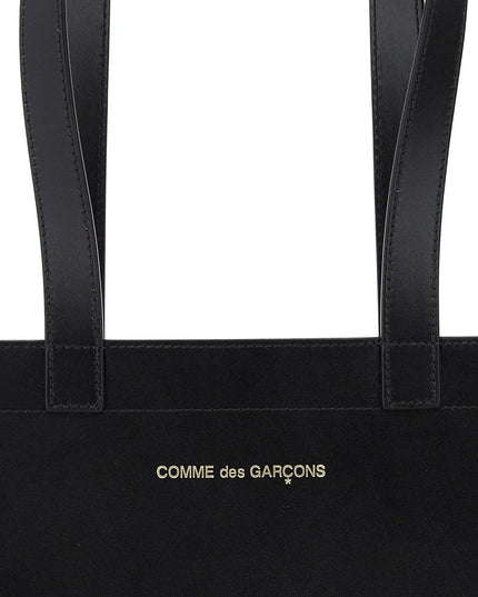 Comme Des Garcons Wallet leather tote bag with logo