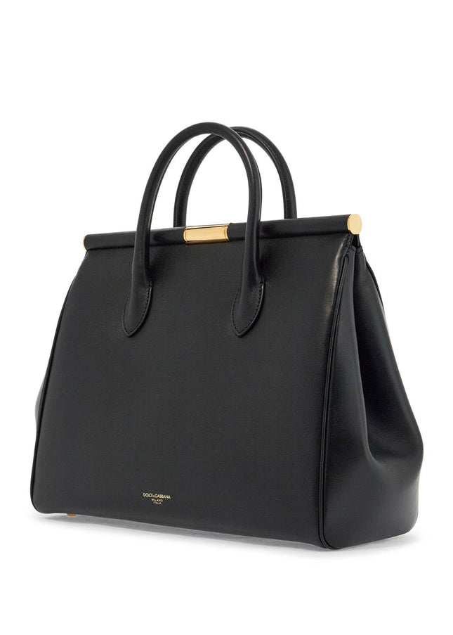 Dolce & Gabbana black calfskin top handle bag with classic and structured shoulder strap