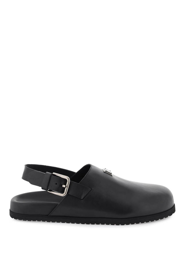 Dolce & Gabbana leather clogs with logo plate