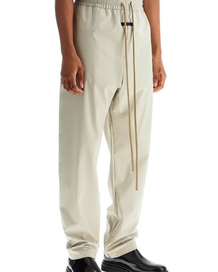 Fear Of God wide leg nylon track pants in cement