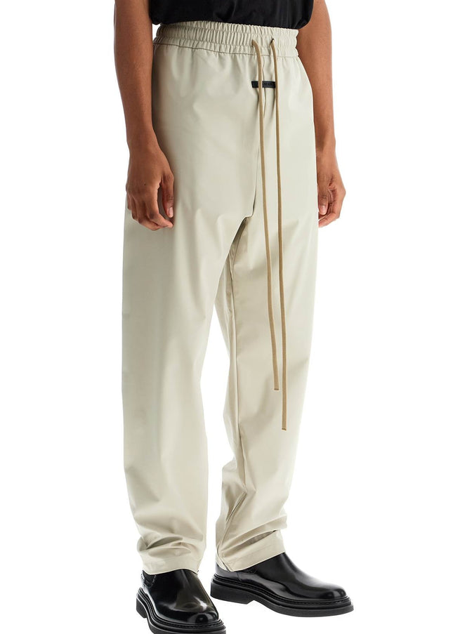 Fear Of God wide leg nylon track pants in cement