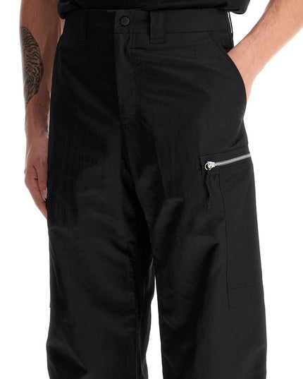 OUR LEGACY tactical cargo pants in technical satin fabric