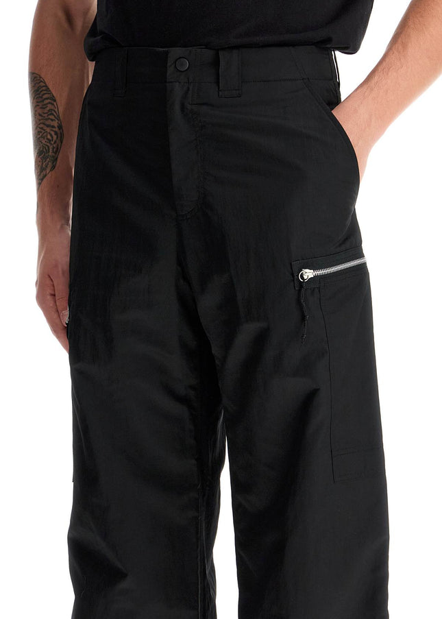 OUR LEGACY tactical cargo pants in technical satin fabric