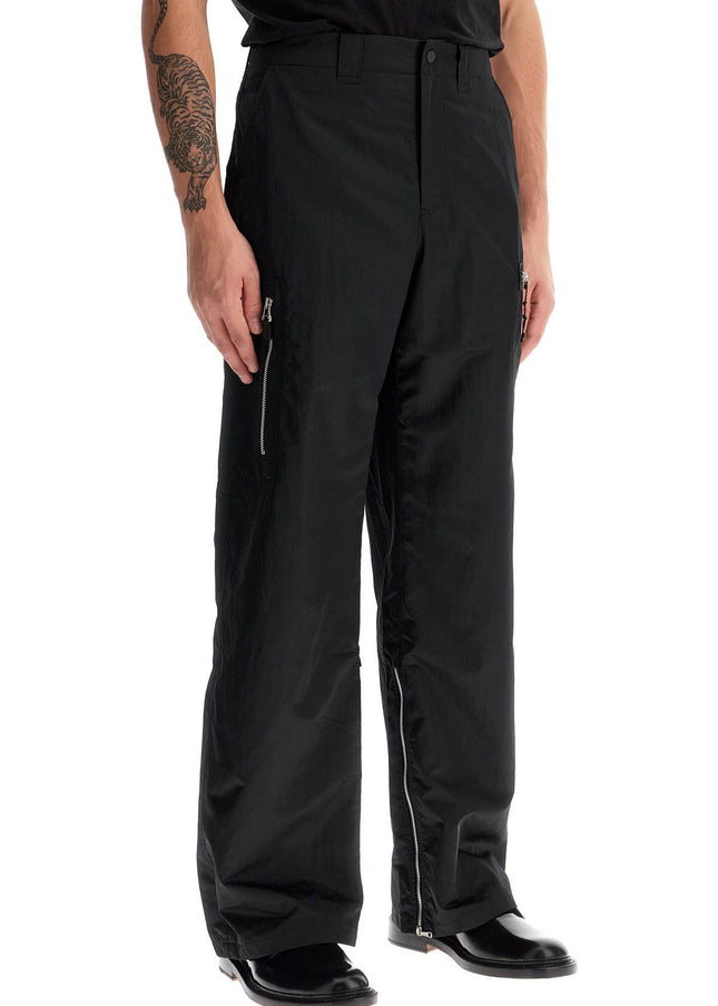 OUR LEGACY tactical cargo pants in technical satin fabric