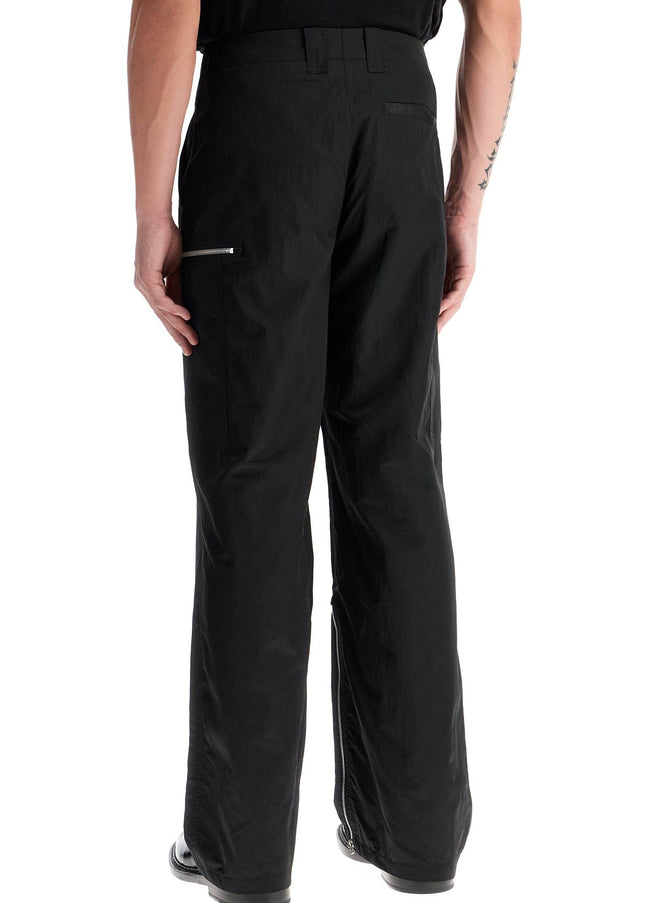 OUR LEGACY tactical cargo pants in technical satin fabric