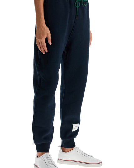 Thom Browne color block fleece joggers for men