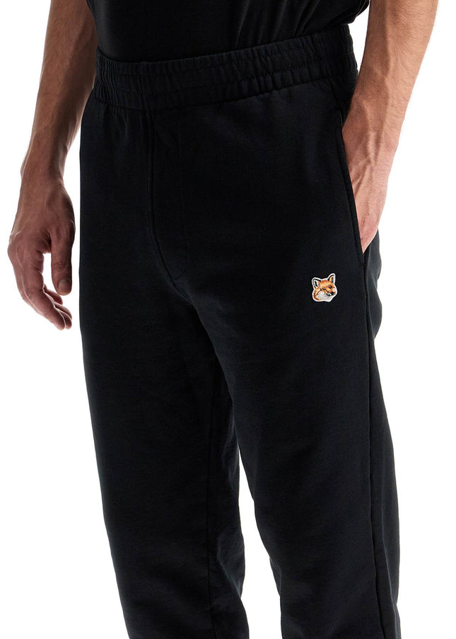 Maison Kitsune fox head joggers