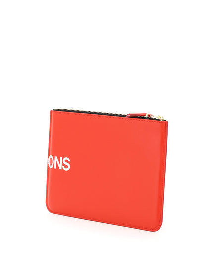 Comme Des Garcons Wallet leather pouch with logo