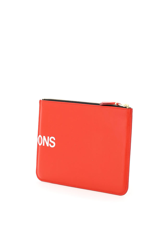 Comme Des Garcons Wallet leather pouch with logo