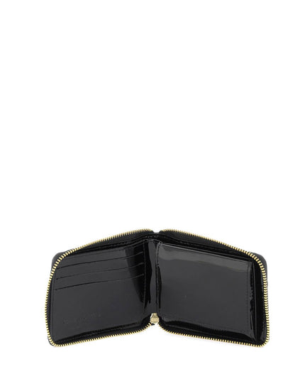 Comme Des Garcons Wallet zip around patent leather wallet with zipper