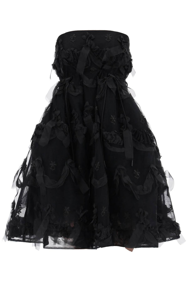 Simone Rocha tulle dress with bows and embroidery.