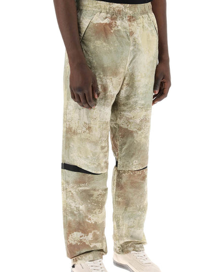 Stone Island econyl printed dissolving grid camo pants