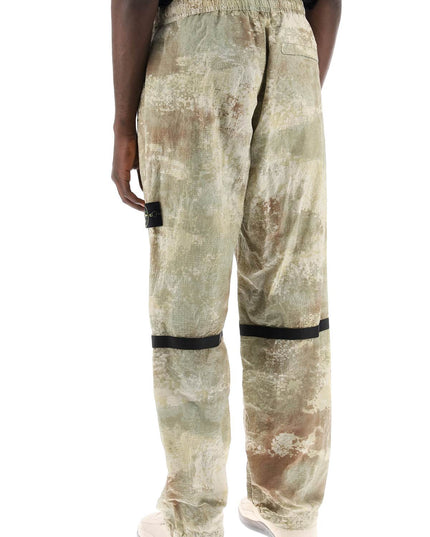 Stone Island econyl printed dissolving grid camo pants