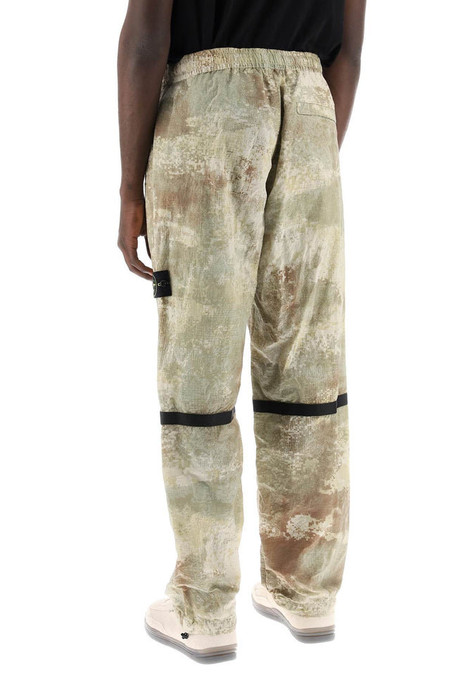 Stone Island econyl printed dissolving grid camo pants