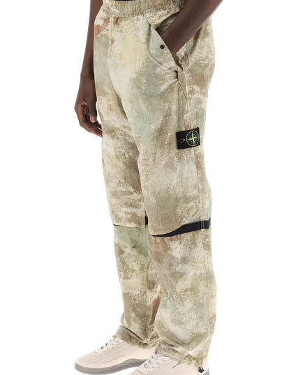 Stone Island econyl printed dissolving grid camo pants