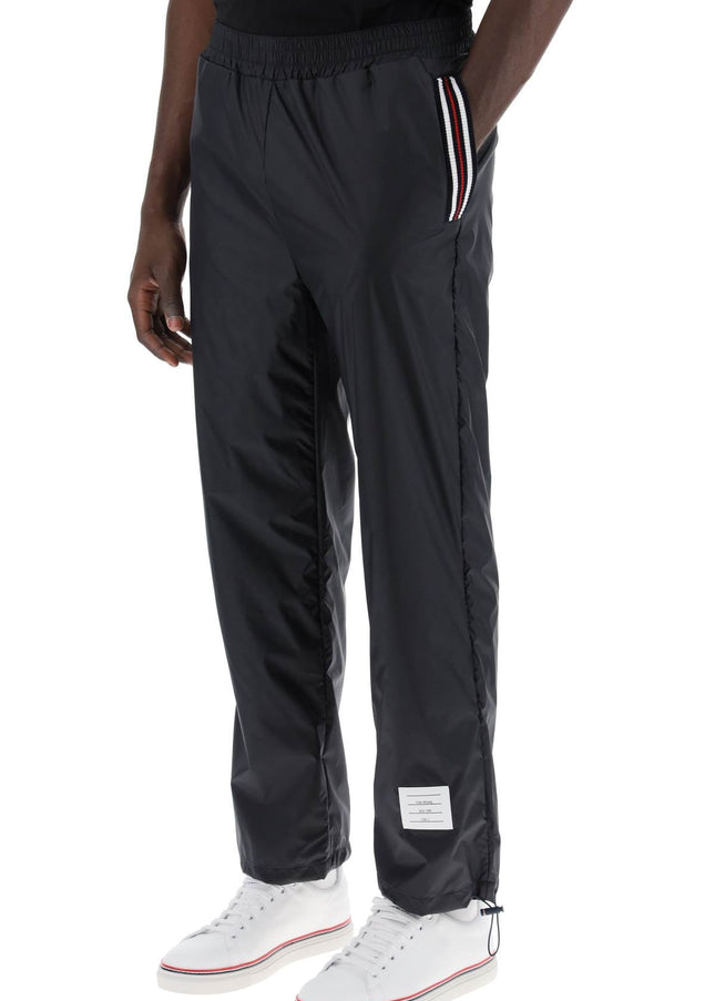 Thom Browne cricket stripe ripstop pants for