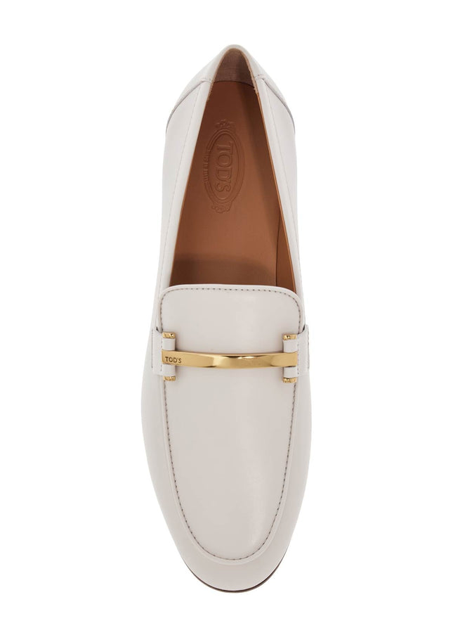 Tod'S white calfskin moccasin with gold bar and velcro closure