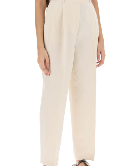 Toteme double-pleated viscose trousers