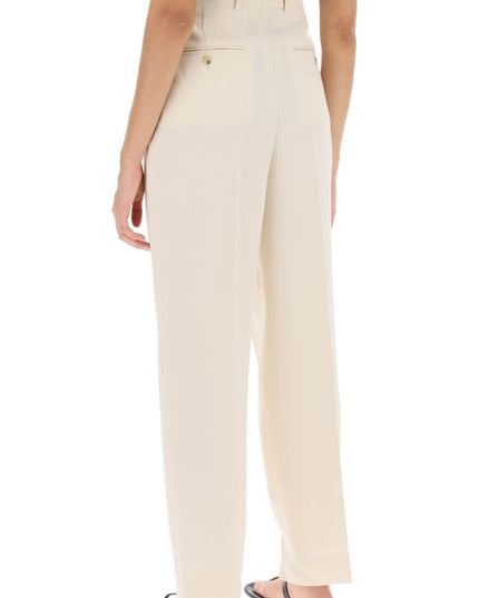 Toteme double-pleated viscose trousers