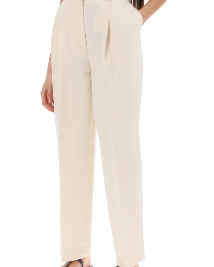 Toteme double-pleated viscose trousers