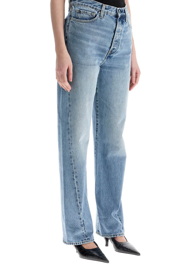 Toteme wide leg organic cotton jeans in worn blue with twisted seams