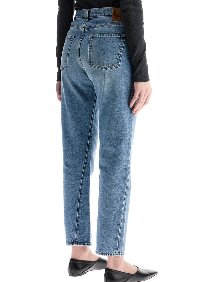 Toteme worn blue organic cotton jeans with twisted seams