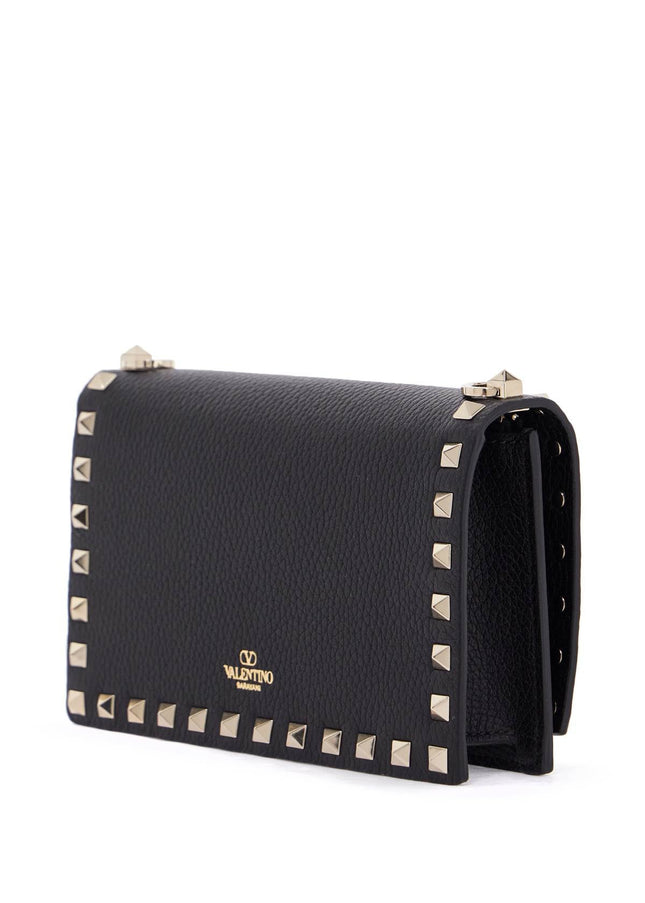 Valentino Garavani mini black leather bag with golden metal studs