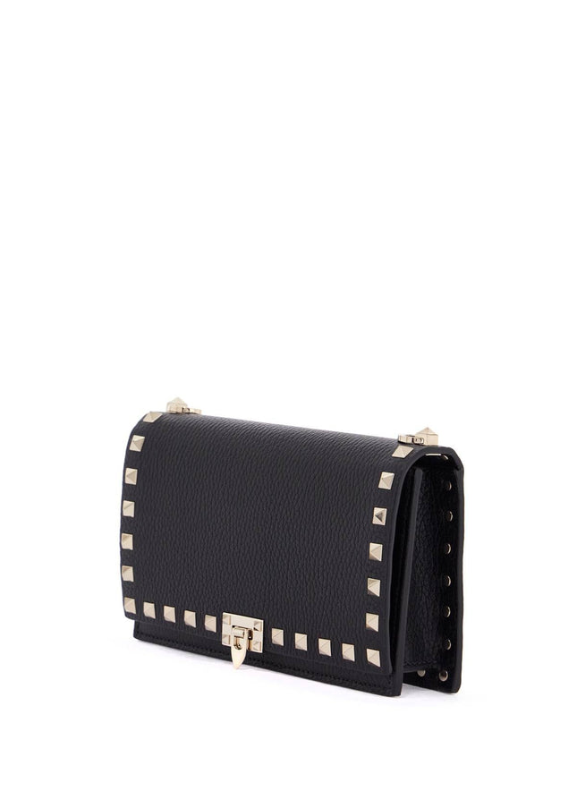 Valentino Garavani mini black leather bag with golden metal studs