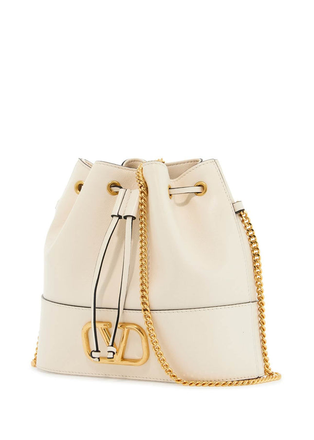 Valentino Garavani mini bucket bag in ivory leather with chain