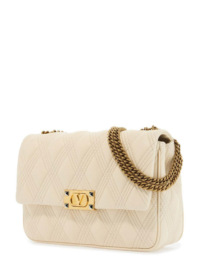 Valentino Garavani quilted shoulder bag butter white with golden chain