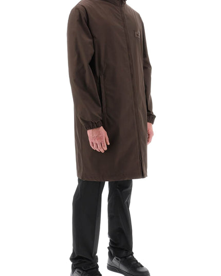 Valentino Garavani raincoat with maison valentino rubber label