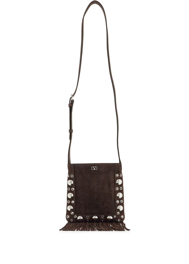 Valentino Garavani small suede crossbody bag in dark brown with studs and fringe