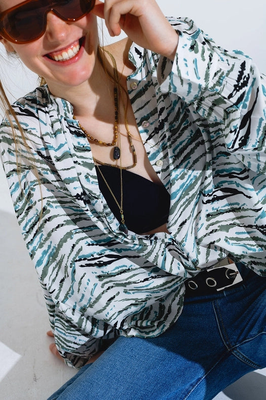 White Blouse With Animal Print And Long Sleeves