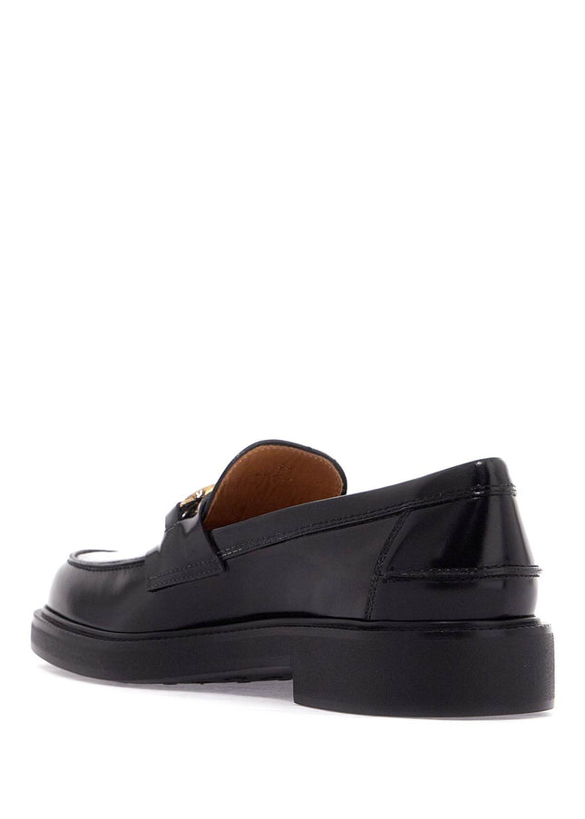 Tod'S metal logo loafers with metal detailing