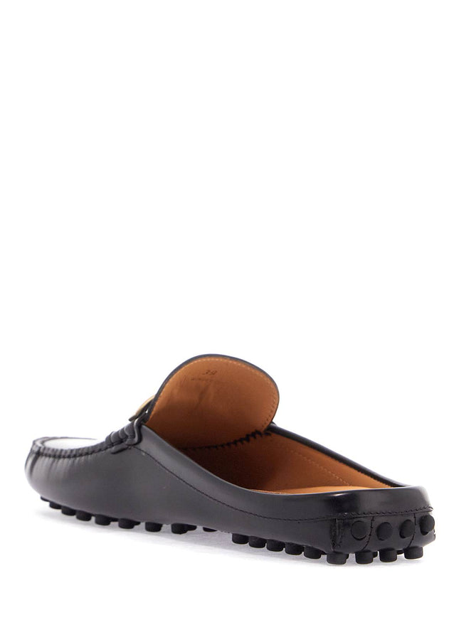 Tod'S black calfskin slip-on loafers with metallic strap and rubber sole