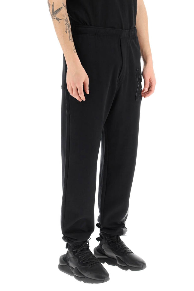 Jogger Pants With Coated Detail - Black
